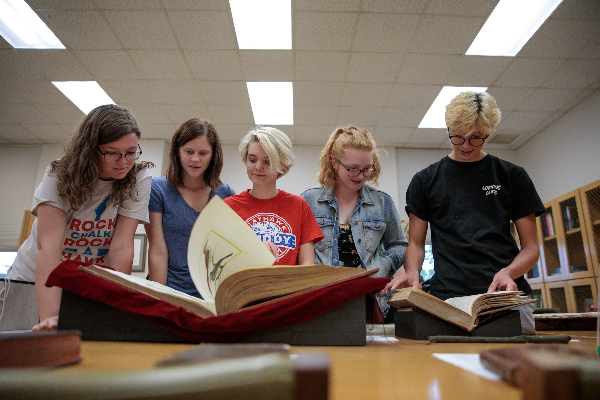 People looking at books