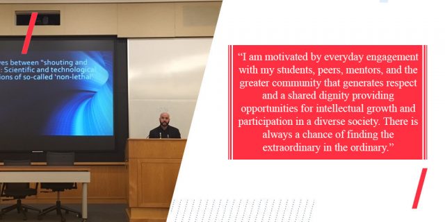 Sam Henkin speaking at a podium with the text 'I am motivated by everyday engagement with my students, peers, mentors, and the greater community that generates respect and a shared dignity providing opportunities for intellectual growth and participation in a diverse society. There is always a chance of finding the extraordinary in the ordinary.'