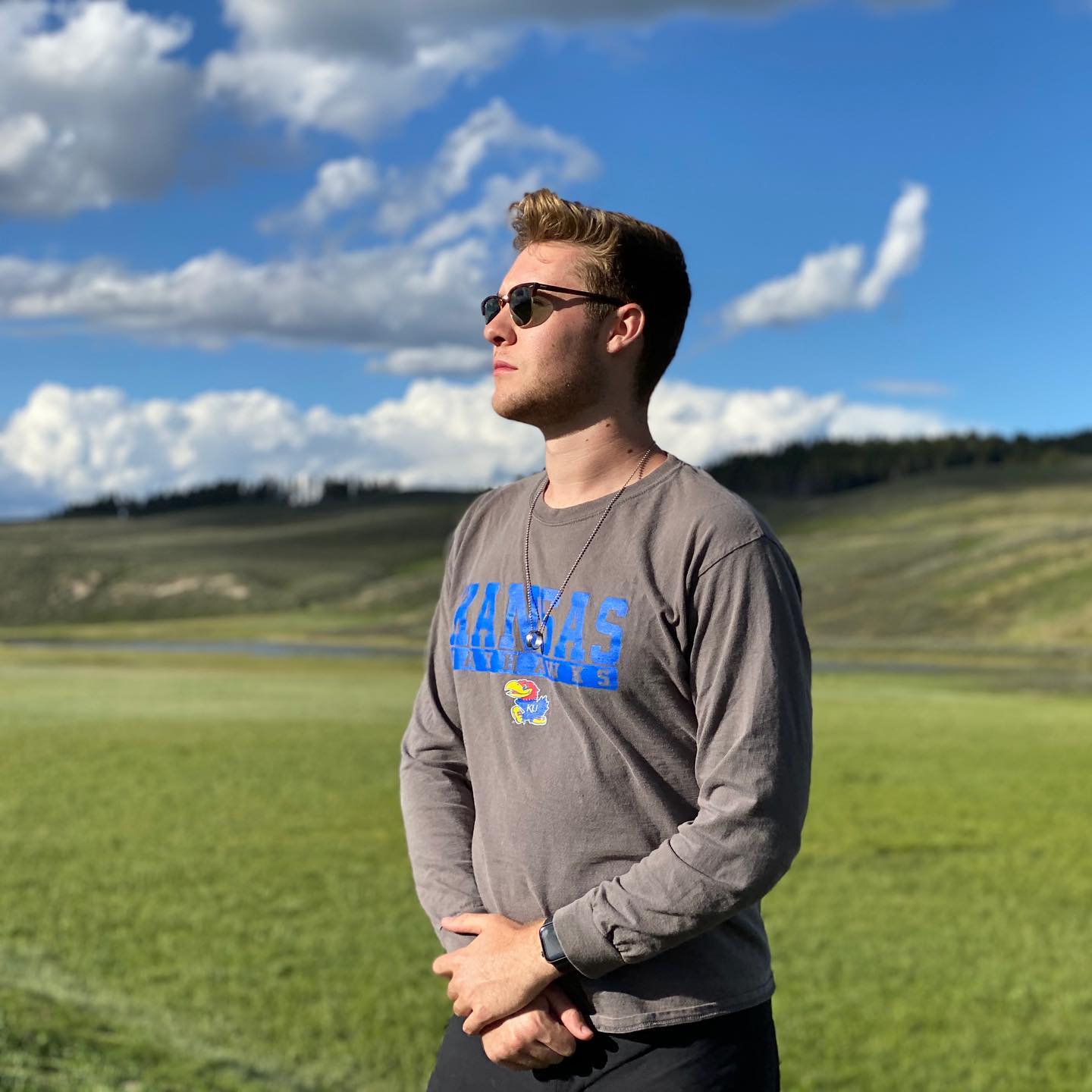 Mason on a green grass field