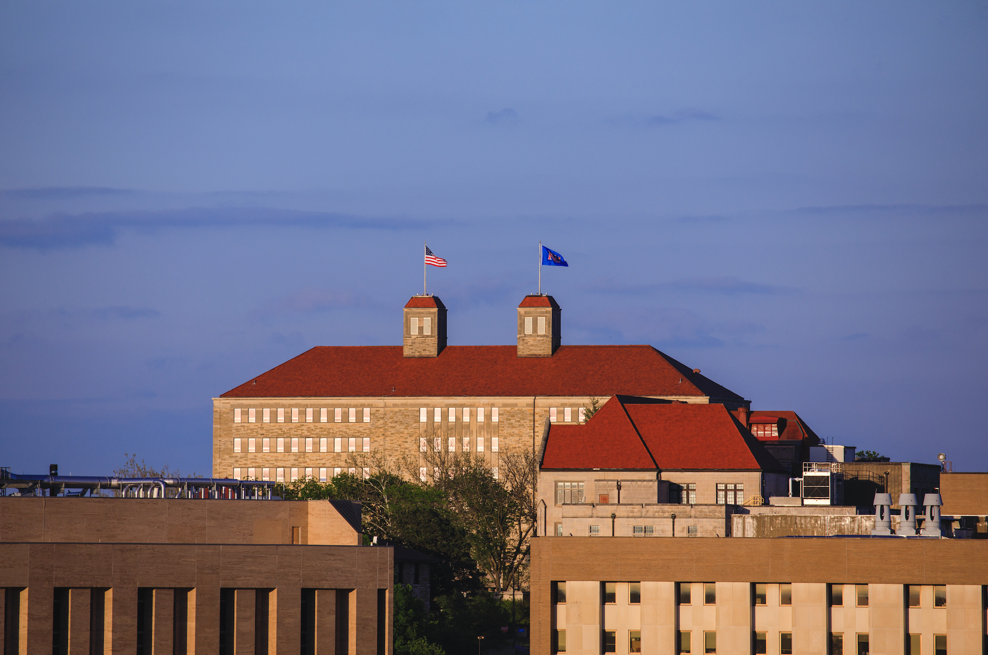 Fraser Hall with a dark blue sky behind it