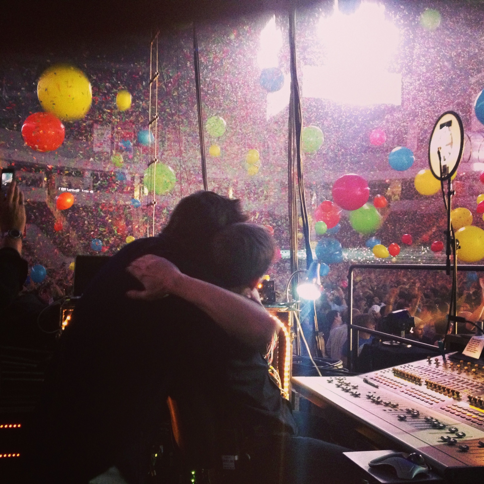 Brent at a concert with balloon celebrations