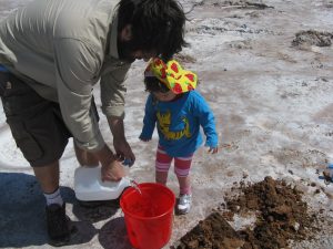 Craig Marshall and his daughter collecting gypsum crystals in Oklahoma.