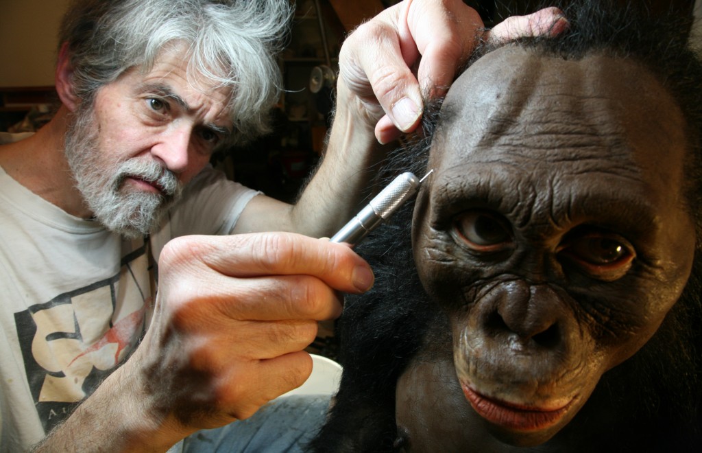 John Gurche works on a reproduction