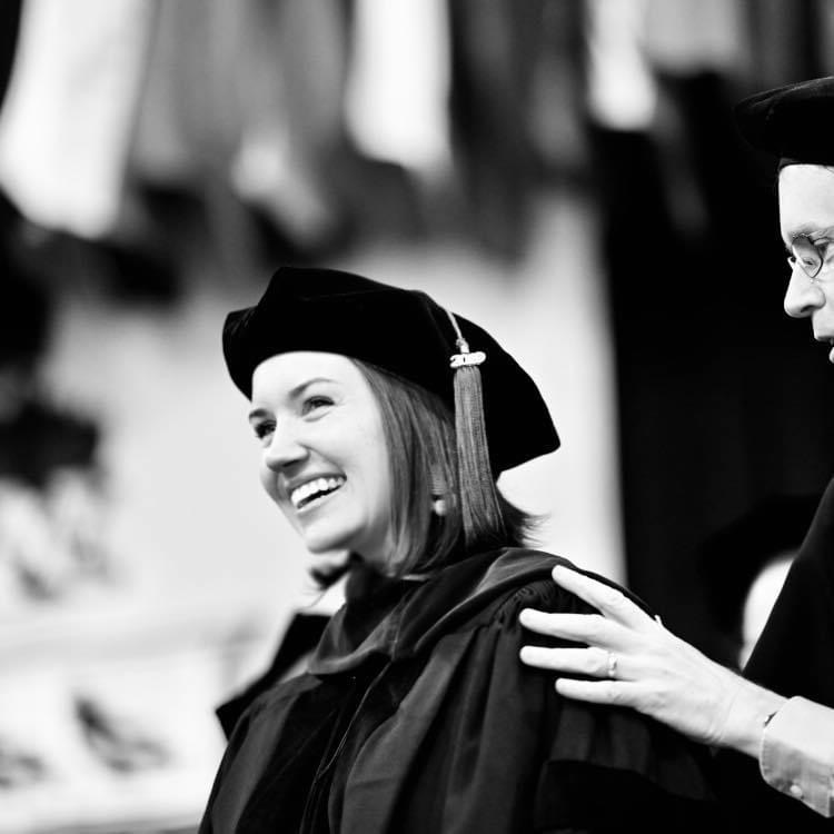 madeline smiling with a graduation cap