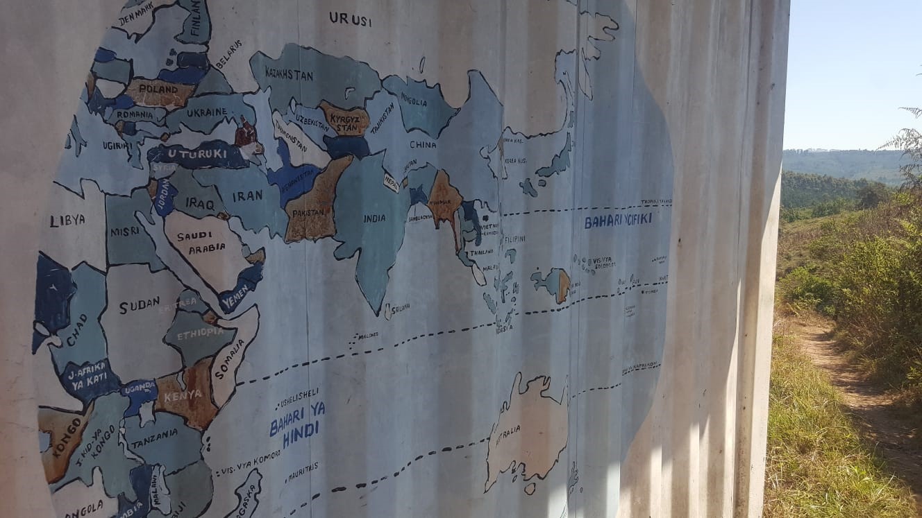 A world map in Kiswahili located in Mufindi, Iringa District, Tanzania