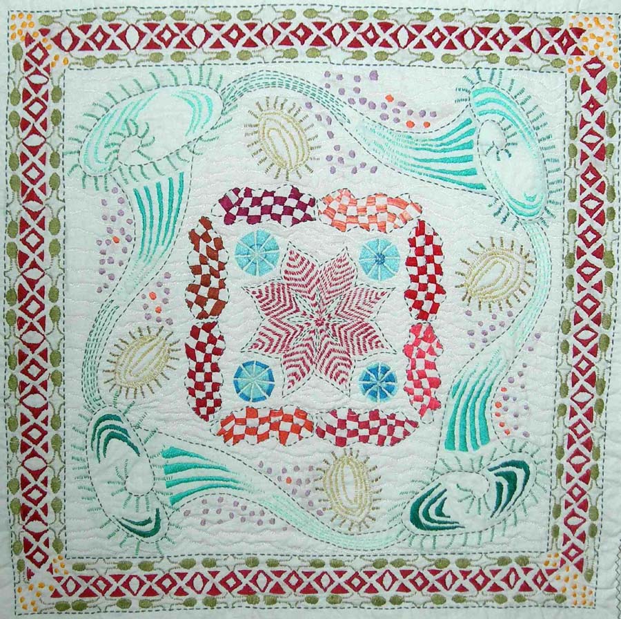 a quilt called Protozoans with cell like embroidery