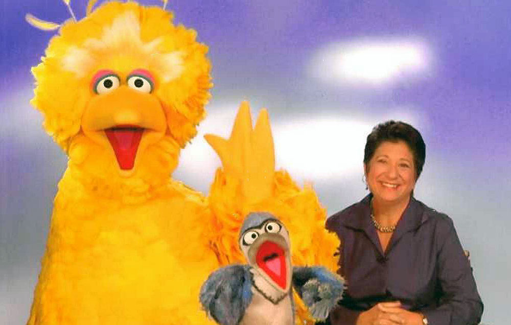 Rosemarie Truglio with Sesame Street muppets including Big Bird