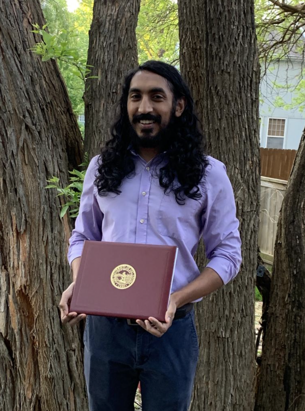 Rabin Valluri with his diploma