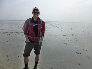 Sundberg standing in the middle of the Waddenzee, an intertidal zone along the northern coast of the Netherlands.