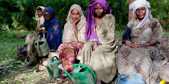 Village women with their water pitchers