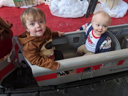 Alex's two sons in a pull wagon