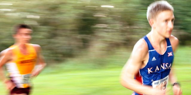 Carson running for the University of Kansas. 