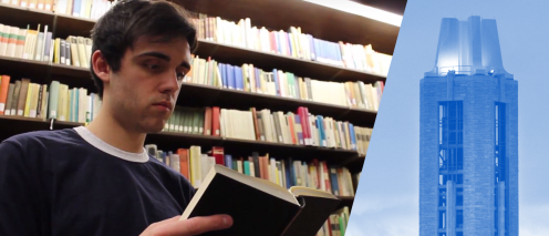 Korbin Painter reading a book at the library