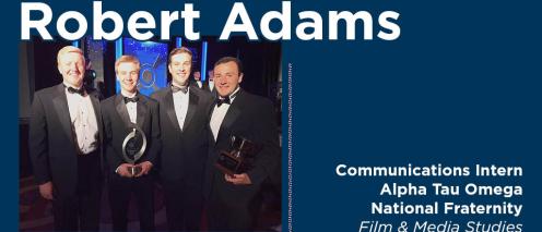Robert Adams with others in formal dress holding an award with the text 'Communications Intern Alpha Tau Omega National Fraternity Film & Media Studies'