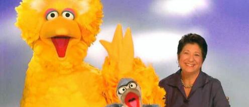 Rosemarie Truglio with Sesame Street muppets including Big Bird