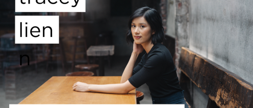 Tracey Lien sitting at a table with the text MFA, creative writing (2021)