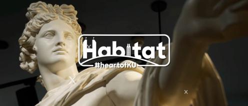 A poster with a statue and Habitat logo