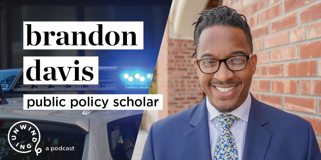 Text that reads "brandon davis public policy scholar" in front of image of police car next to a photo of a man in a blue blazer, with a polka dot tie, wearing glasses and dreadlocks